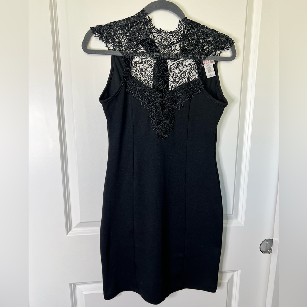 Black, lacy cocktail NYE, party, event, vacation dress. Fits like a small